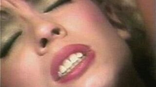 Two curly head sucking dick - porn video